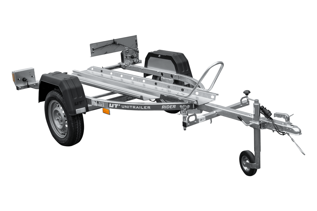 Rimorchio per motociclette Unitrailer Rider 1 2256 × 1110 mm, peso totale ammesso 350–450 kg, rotaia in acciaio, versione non frenata